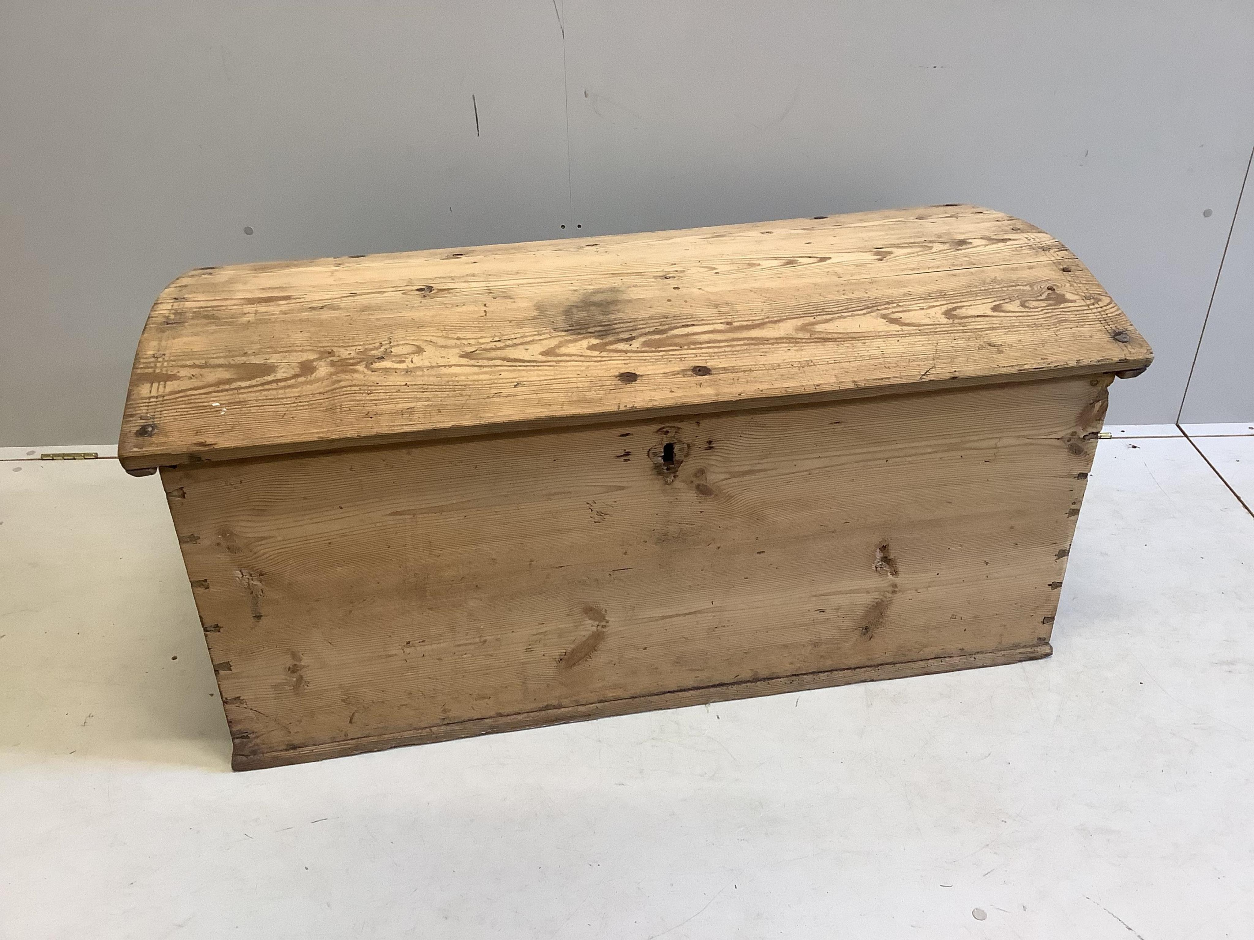 A 19th century Continental pine domed top trunk, width 127cm, depth 58cm, height 57cm. Condition - fair